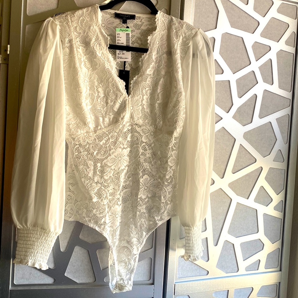 White long sleeve Bodysuit New. Large.